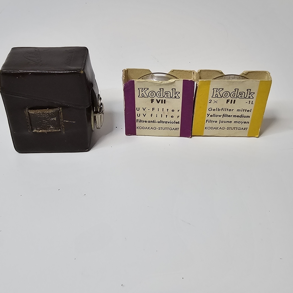 Kodak A.G. lens filters and case UV FVII/32 -oL and Yellow FII/32 -1L=2x